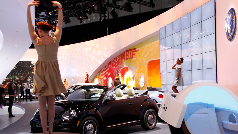 Illustration for article titled The Booth Professionals Of The LA Auto Show